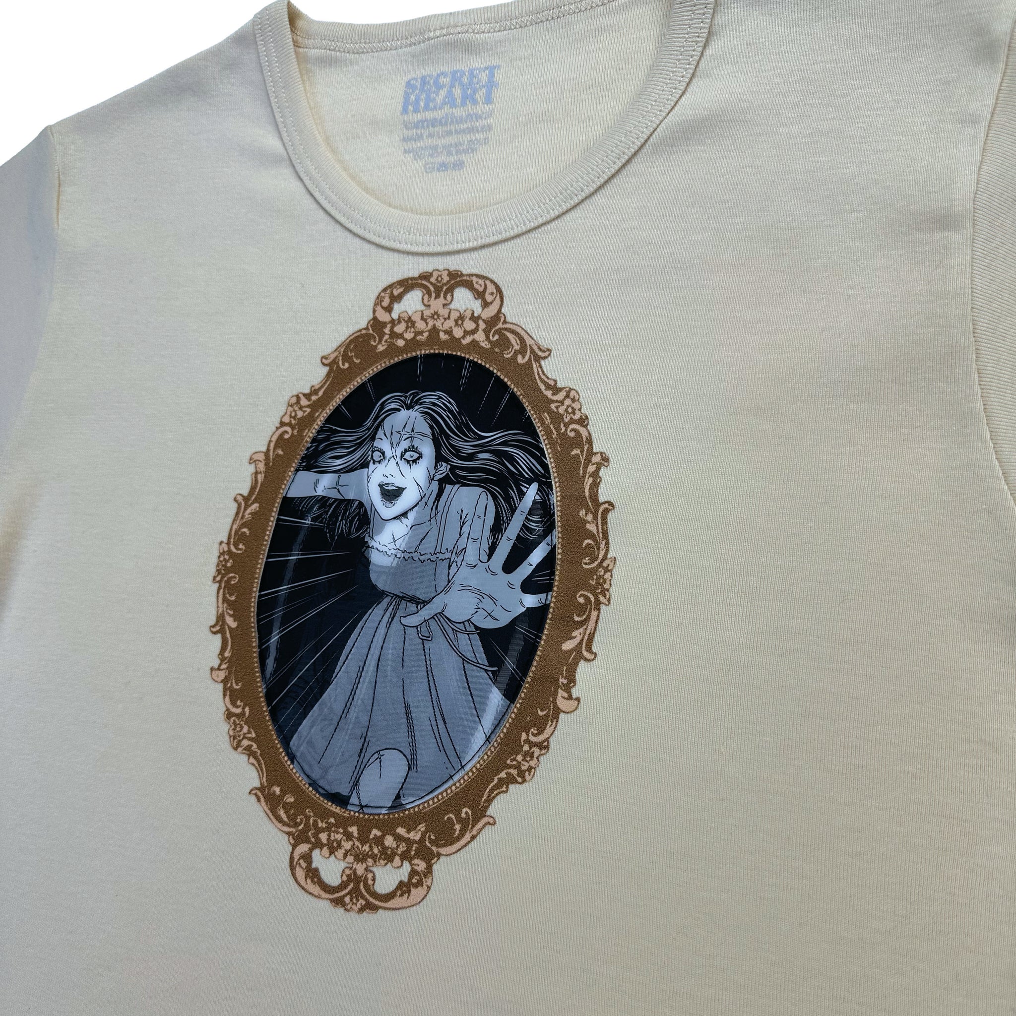 Haunting Beauty Tan Baby Tee